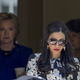 Abedin walks ahead of Clinton following a private meeting with Sen. Elizabeth Warren, D-Mass., Friday, June 10, 2016, at Clinton’s home in Washington. Photo via AP